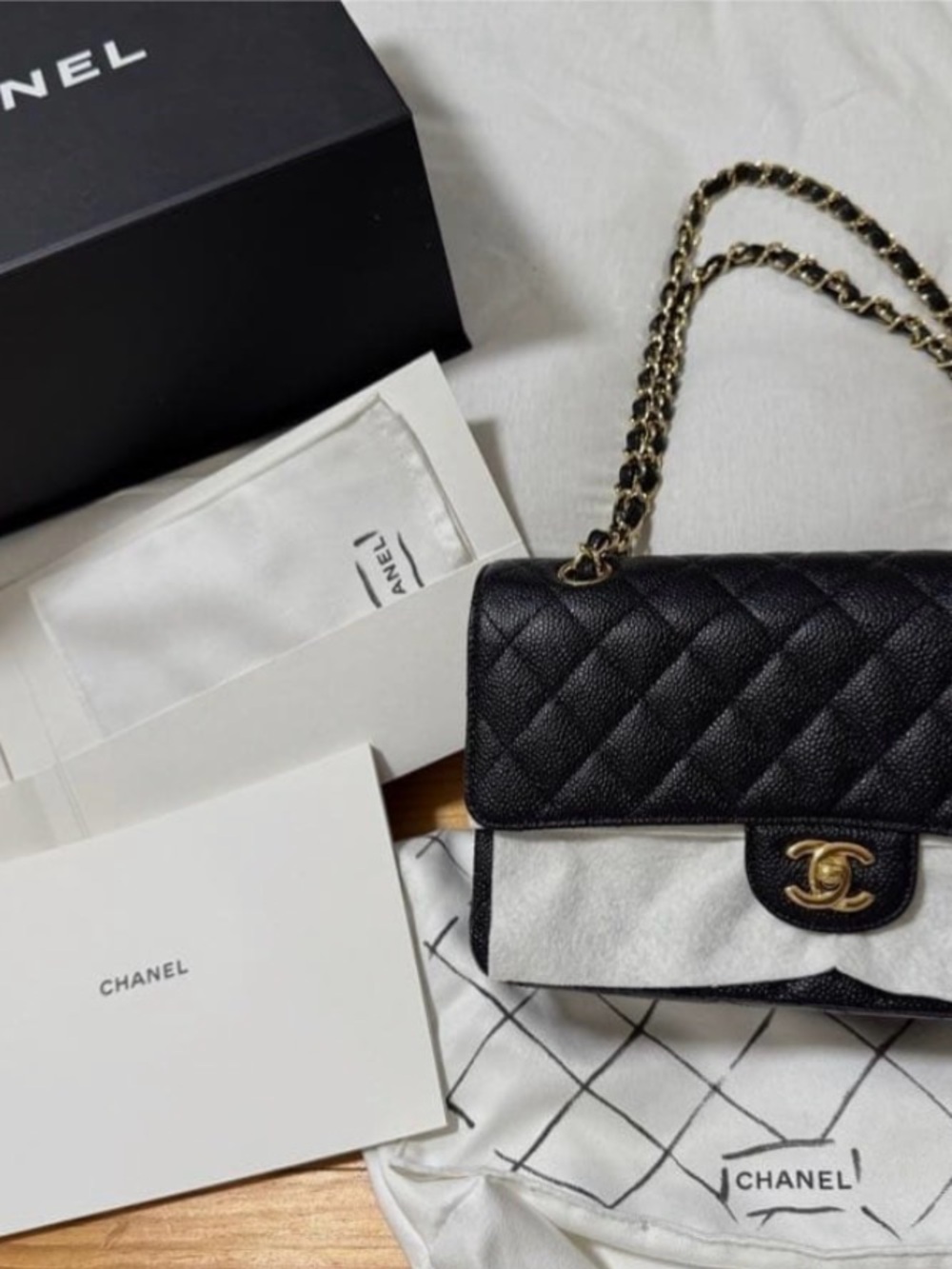 CHANEL Black Quilted Leather Shoulder Bag with Gold Chain